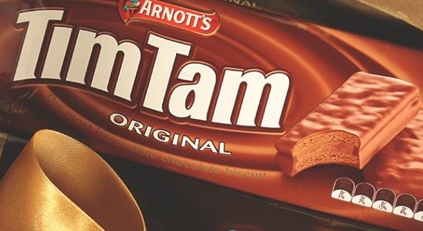 Tim Tams available despite Coles price row, insists Arnott's